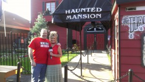 Dave and Jodi in front of the not so haunted house at the fair